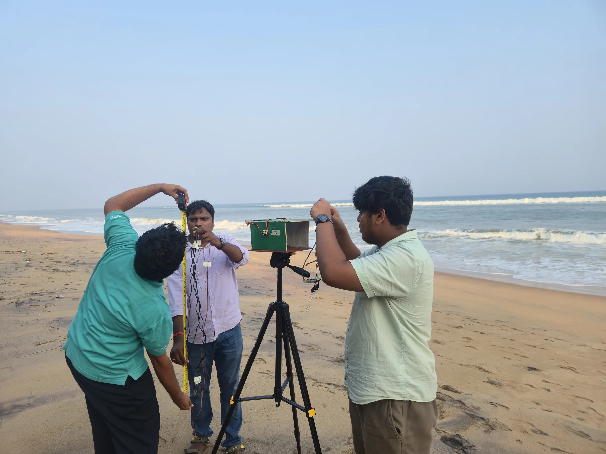 The TurtleGuard field team working with the prototype at Bateswar Beach